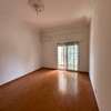 Salon spacieux parquet clair avec balcon lumineux thumb 2