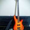 Basse électrique active 4 cordes orange avec étui thumb 2