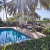 UN TRES JOLI APPARTEMENT AVEC PISCINE JARDIN ET VUE SUR  MER thumb 4