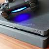 PlayStation 4 slim plus 20 jeux thumb 1