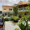 VILLA AVEC 5 STUDIOS ET DEUX APPARTEMENTS / Saly thumb 0