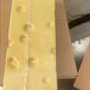 Emmental traditionnel bloc entier jaune clair à trous thumb 1