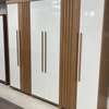 Armoire blanche 6 portes 4 tiroirs bois robuste thumb 1
