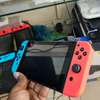 Nintendo switch + 10 jeux thumb 0