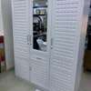 Armoire marron ,blanc et noire thumb 0