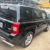 Jeep SUV noir patriot spacieux polyvalent et fiable thumb 2