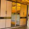 Armoire 4 portes bois  avec miroir central thumb 1