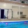 NGAPAROU VILLA LUXUEUSE  CHAMBRE MEUBLE ACCES PISCINE thumb 4