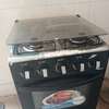 Nexon cuisinière gaz 4 feux noir avec four thumb 0