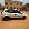 Opel Almera berline compacte essence blanche thumb 2