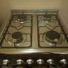 Cuisinière à gaz inox 4 brûleurs avec four intégré thumb 1