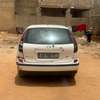 Opel Almera berline compacte essence blanche thumb 0