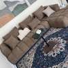 Canapé d'angle moderne gris clair avec pouf orange thumb 1