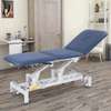 Table de massage électrique réglable avec roulettes thumb 1