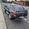Mitsubishi l 200 thumb 1