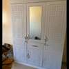 Armoire marron blanc et noire thumb 4