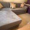Canapé d'angle beige clair 5-6 places avec pouf rouge thumb 7