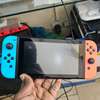 Nintendo switch + 10 jeux thumb 1