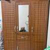 Armoire marron blanc et noire thumb 0