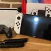 NINTENDO SWITCH OLED +Jeux thumb 1