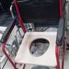 Chaise roulante avec pot neuve thumb 1