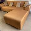 Canapé d'angle beige clair 5-6 places avec pouf rouge thumb 1