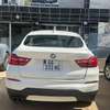 BMW X4 2016 blanc SUV compact performant thumb 2