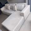 Canapé d'angle beige clair 5-6 places avec pouf rouge thumb 0