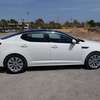 Kia Optima K5 berline blanche thumb 0