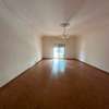 Salon spacieux parquet clair avec balcon lumineux thumb 0