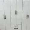 Armoire blanche 6 portes 4 tiroirs bois robuste thumb 3
