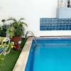 Appartement meublé piscine jardin 3 chambres salon Virage thumb 0