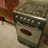 Cuisinière à gaz inox 4 brûleurs avec four intégré thumb 0