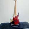 Basse électrique 4 cordes rouge foncé avec étui rigide thumb 2