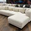Canapé d'angle blanc cassé avec pouf orange design thumb 1