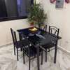 Ensemble table et 4 chaises noires design moderne thumb 0