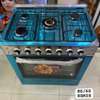 Cuisinière gaz inox 5 feux avec four intégré thumb 1