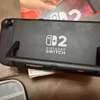 Nintendo Switch 2 NEUVE + 2 jeux (FC26  Street Fighter 6) thumb 4