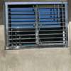 Grille fenêtre acier inoxydable design moderne 60x40cm thumb 1