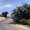1300m2 angle en bordure de route en face ngor diarama thumb 1