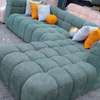 Canapé d'angle blanc cassé avec pouf orange design thumb 5