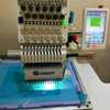Machine broderie thumb 1