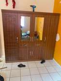 Armoire bois 4 portes
