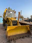Max Trac chargeuse pelle hydraulique jaune chantier