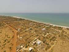Terrain Titre foncier 2 km du port Ndayan