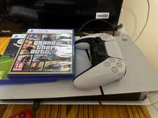 PS5 SLIM 1To -+ 2 jeux + 1 manette et accessoires