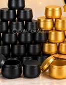 Pots cosmétiques noirs et dorés solides