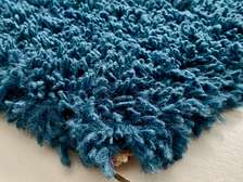 Tapis bleu 170cm sur 120cm