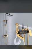 Colonne de douche thermostatique dorée avec douchette