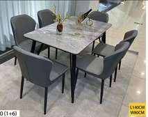 Ensemble table marbre + 6 chaises matelassées 2024